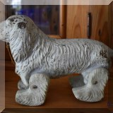 D68. Antique wooden dog. 8”h x 11”w - $24 